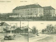 Klasicistní správní budovy vystavěné r. 1830 v předzámčí na dobové pohlednici.